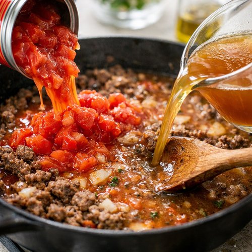 Step 3: Add Your Tomatoes and Broth